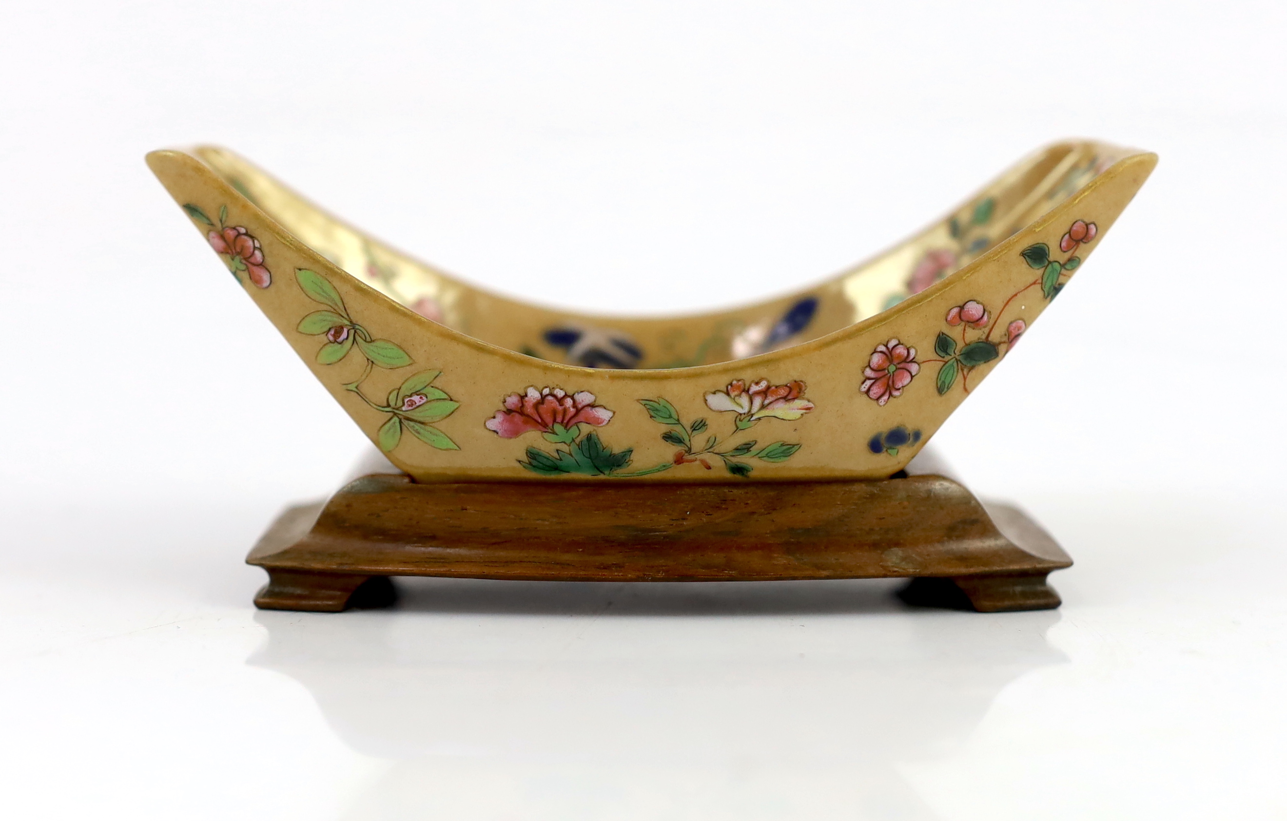 A Chinese enamelled porcelain ingot-shaped cup stand, Daoguang seal mark and of the period (1821-50)